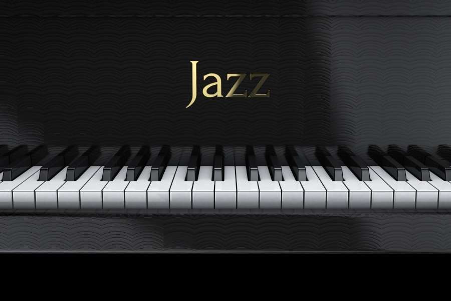 Piano avec typographie Jazz dorée sur fond texturé noir Clavier de piano noir et blanc avec le mot Jazz écrit en lettres dorées élégantes